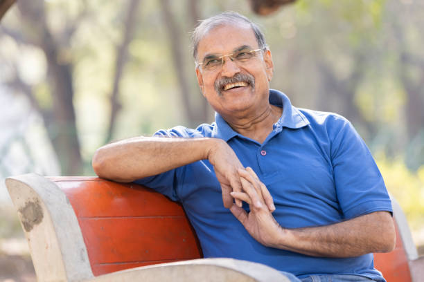 istock Happy senior man at park 1475212781