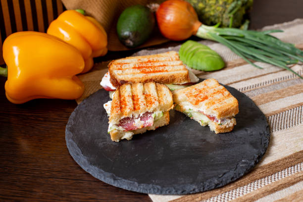 istock toasted avocado and tomato sandwich 1475213109