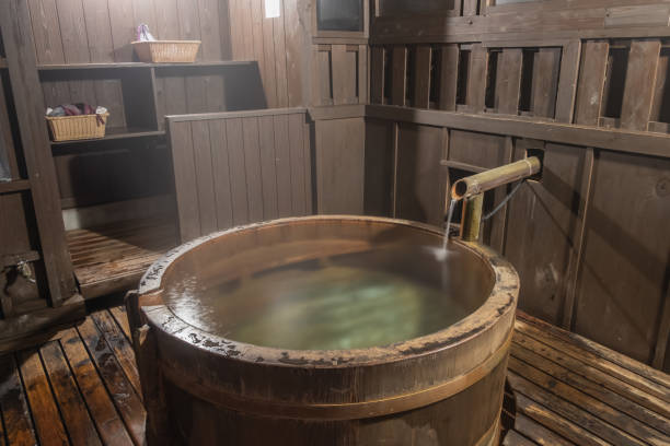 istock Wooden bamboo barrel bath onsen, Japanese hot spring 1475213473