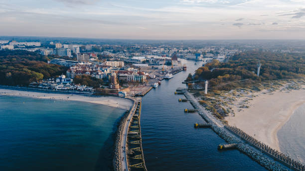istock Harbour, lighthouse and pier in Kolobrzeg, Poland. 1475215208
