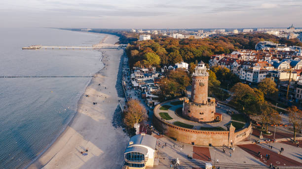 istock Harbour, lighthouse and pier in Kolobrzeg, Poland. 1475215324