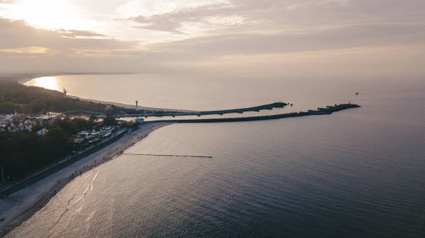 istock Harbour, lighthouse and pier in Kolobrzeg, Poland. 1475216198