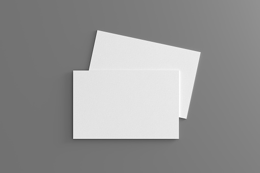 Business card mockup. Pair of business card on gray background. View directly above. 3d illustration