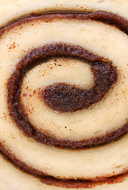 istock Macro of cinnamon bun swirl with selective focus on center 147521991