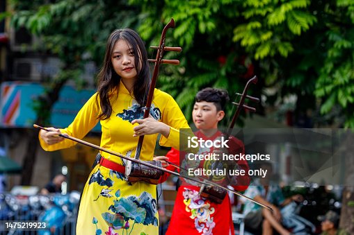 Traditional street music in the streets of Hanoi in Vietnam