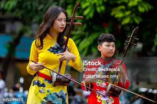 Traditional street music in the streets of Hanoi in Vietnam