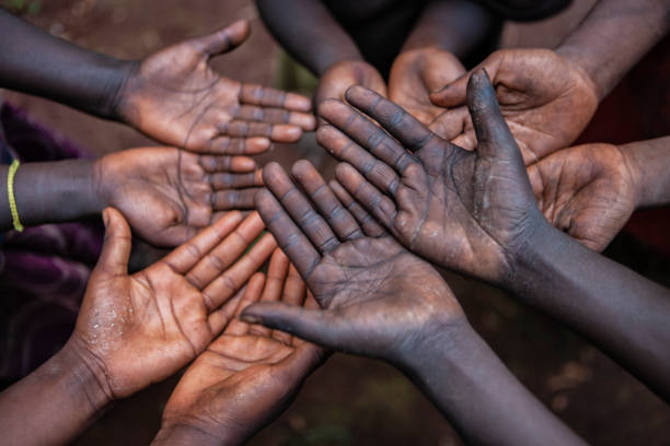 istock Hungry African children asking for help, Africa 1475220057