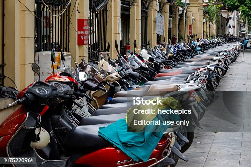 parking motorcycles in the streets of Hanoi in Vietnam