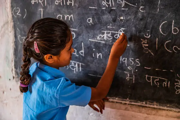 Photo of Indian schoolgirl in classroom