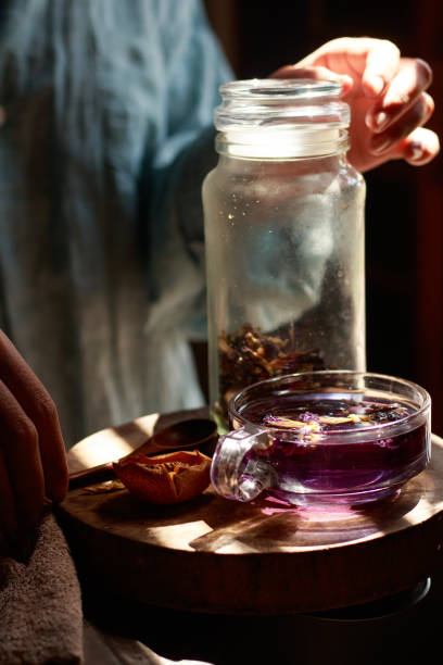 istock Vertical shot of preparing a cup of herbal blue tea 1475221224