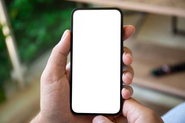 istock man hands holding phone with isolated screen background of cafe 1475222879