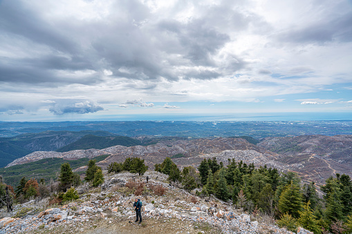 Gülen Dağı, Akseki, Antalya, Turkey-March 19, 2023: climbers are hiking at the The scenic view of Gülen Dağ (1 599m) after the  forest fire in 2022.