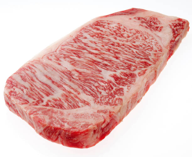 Yonezawa Beef Sirloin Steak Yonezawa beef is characterized by fine marbling, fragrant fat, and sweet red meat. Extravagant thick cut for sirloin steak. marbled meat stock pictures, royalty-free photos & images