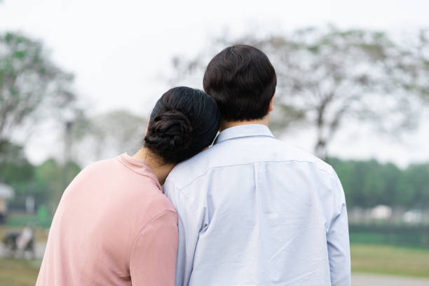 istock Elderly Asian couple in the park 1475229523