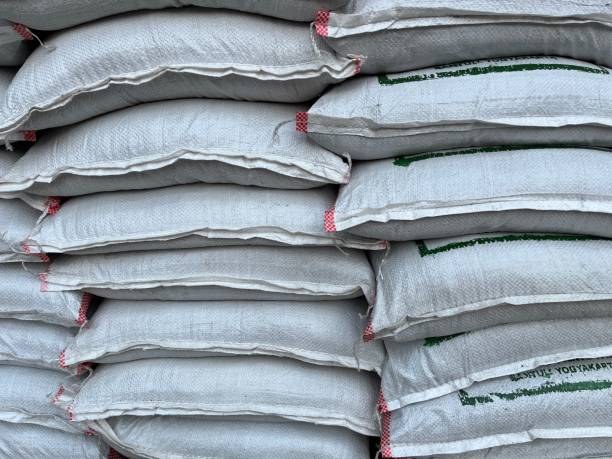 istock Fertilizer bag being stacked in front of a plant shop 1475229811