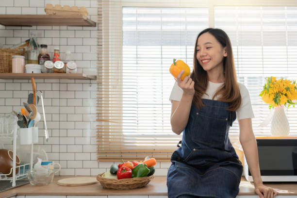 istock woman in the kitchen preparing materials ready to cook 1475233011