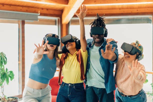 istock group of young multiethnic astonished friends having fun using 3d glasses 1475234596