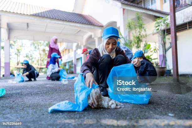 Students With Nature Sense Cleaning School Stock Photo - Download Image Now - Plastic Pollution, Collection, Plastic
