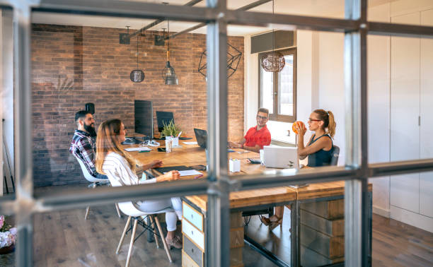 istock Colleagues searching ideas in brainstorm while having fun playing with basket ball 1475234922