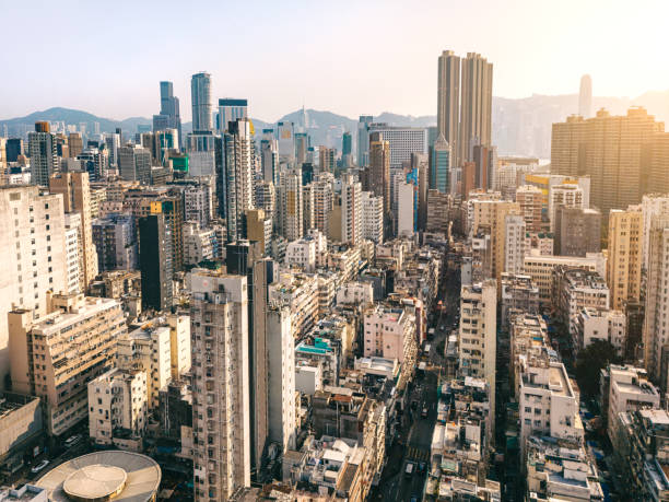 Aerial view of skyscraper buildings in Hong Kong, Top view Streets in Mongkok district. Architecture and transportation background. Aerial view of skyscraper buildings in Hong Kong, Top view mong kok stock pictures, royalty-free photos & images