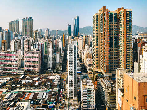 Streets in Mongkok district. Architecture and transportation background. Aerial view of skyscraper buildings in Hong Kong, Top view