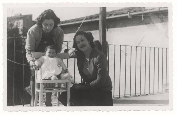 istock Family on balcony in 1949. 1475237401