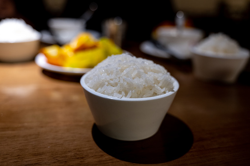 A close-up of white rice on the dining table