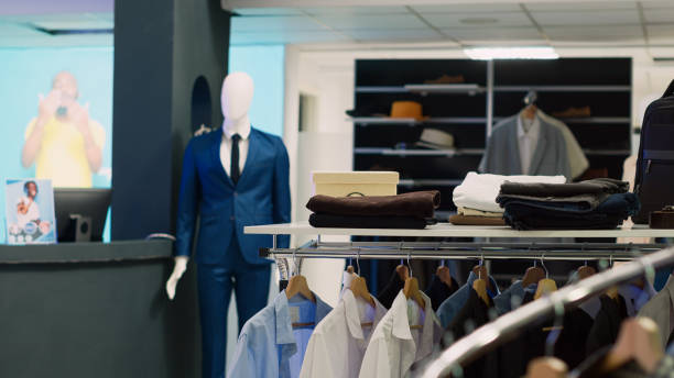 istock Empty clothing store with casual and formal wear design 1475238538