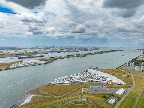 Maaslantkering storm surge barrier  in the Neuwe Waterweg protecting Rotterdam for high water levels. The storm surge is part of the Europoortkering, last section of the Deltaworks storm protection plan.