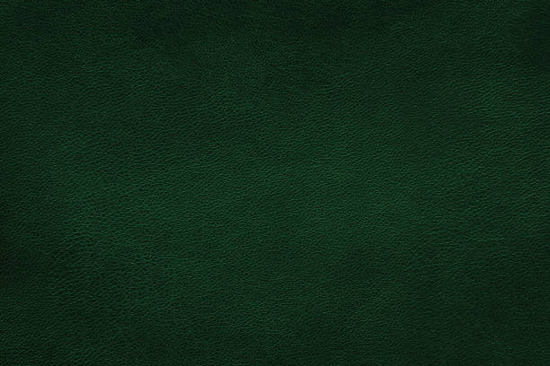 istock Texture of soft dark green leather. Natural cowhide, abstract background. 1475239597
