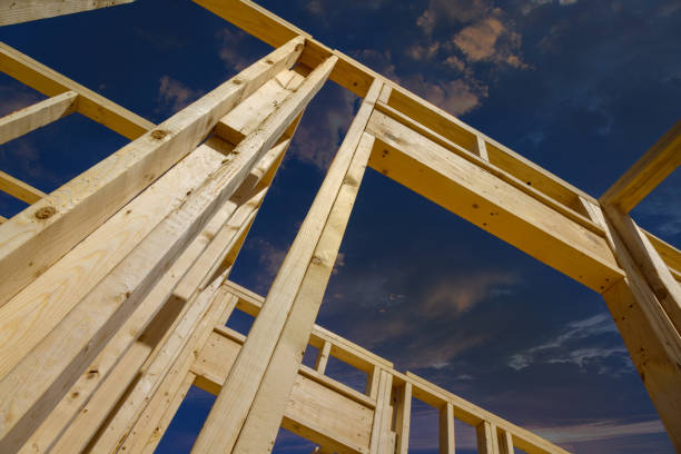 istock The framing beam is a critical component of new house under construction. 1475239632