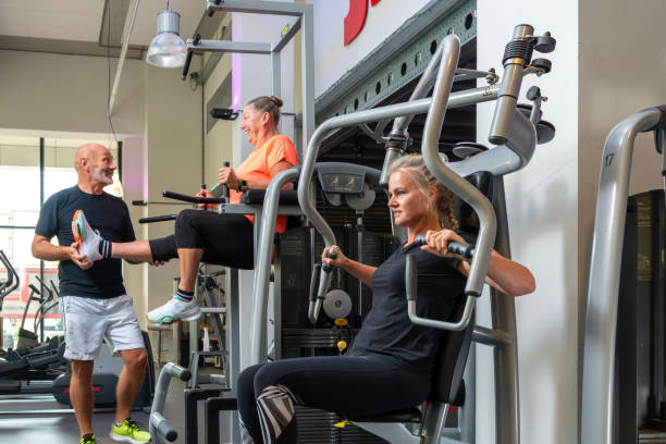 istock Middle-aged friends in the gym. 1475239884
