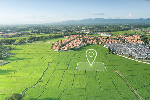 Land plot and identify registration symbol in aerial view. Land plot in aerial view. Gps registration survey of property, real estate for map with location, area. Concept for residential construction and development. Also home, house for sale, buy, purchase. land planning stock pictures, royalty-free photos & images
