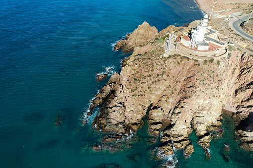 Aerial panoramic view of the coastline and hills of Faro de Cabo de Gata