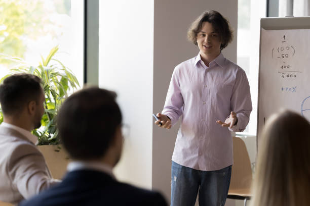 istock Professional training or seminar event with company employees in boardroom 1475257210