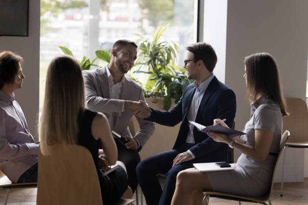 istock Business partners shake hands after successful negotiations 1475257240
