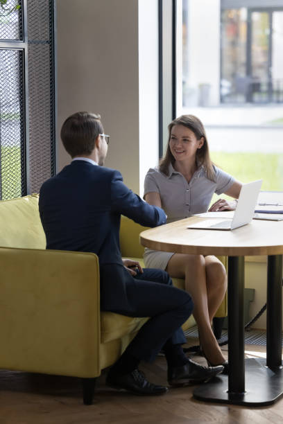 istock Two young business partners shake hands making deal 1475257998