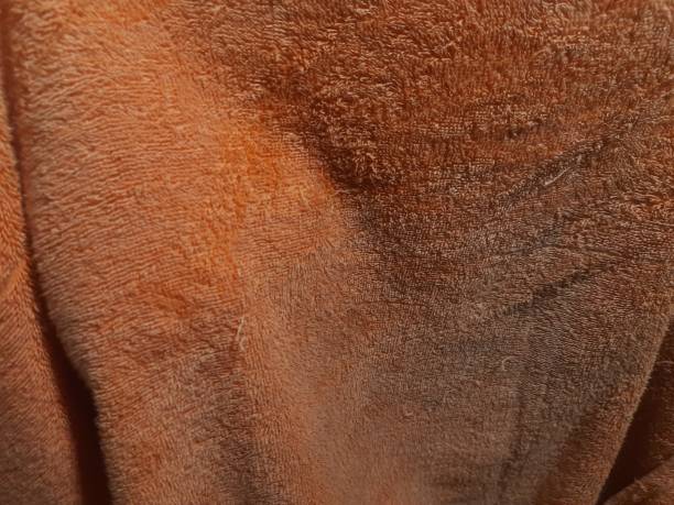 istock orange towel texture close up. background 1475259246