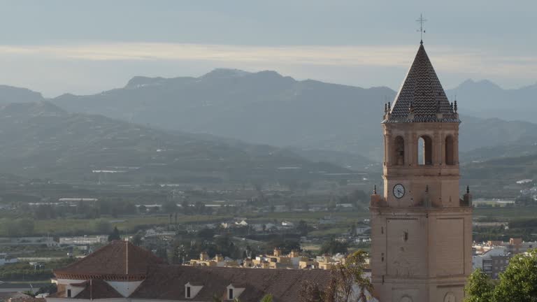 San Juan church tower at sunset , Velez Malaga, Spain