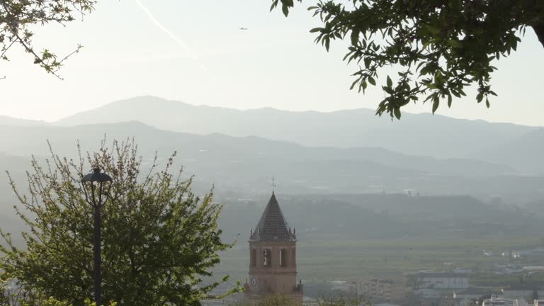 San Juan church tower in Velez Malaga at sunset, Spain