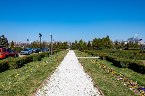 Bucharest, Romania. March 13, 2023: Footpath and car park within Romanian Parliament area