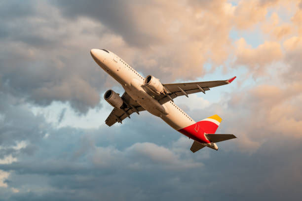 istock Passenger airplane departures at sunset 1475266192