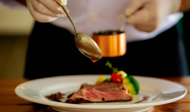 istock Beef steak and human hands,Be sure to have them ready in the restaurant. 1475267385