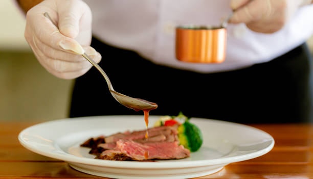 istock Beef steak and human hands,Be sure to have them ready in the restaurant. 1475267438