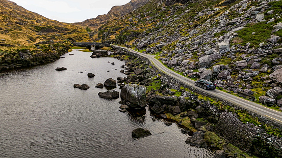 The Gap of Dunloe (from Irish: Dún Lóich, meaning 'Lóich's stronghold'), also recorded as Bearna an Choimín (meaning \