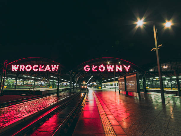 colorful lights on train station at night