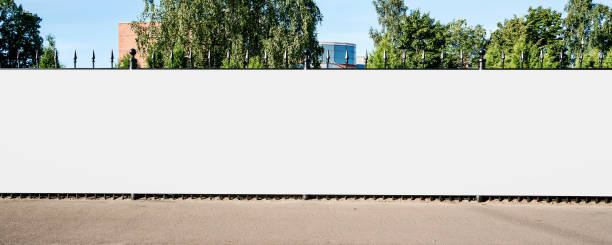 istock Advertisement blank long billboard with copy space for commercial info. 1475274087