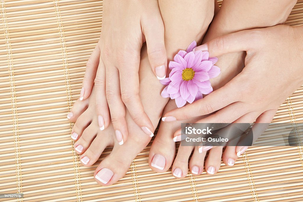 care for beautiful woman legs Fingernail Stock Photo