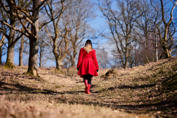 istock Woman in red coat 1475275002
