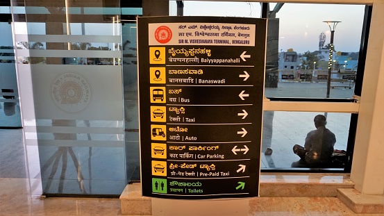 Yellow airport information sign